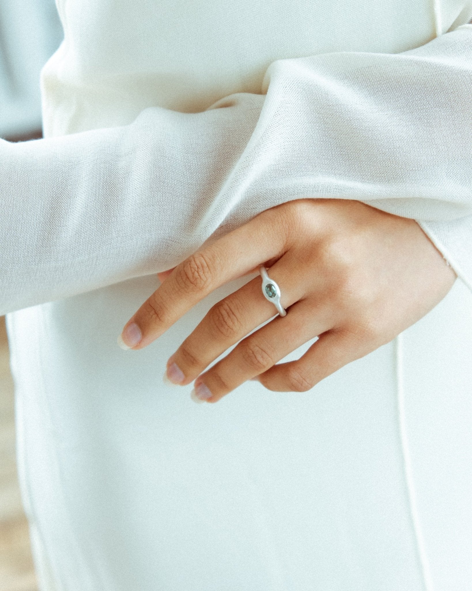 Handcrafted silver donut band ring with stone
