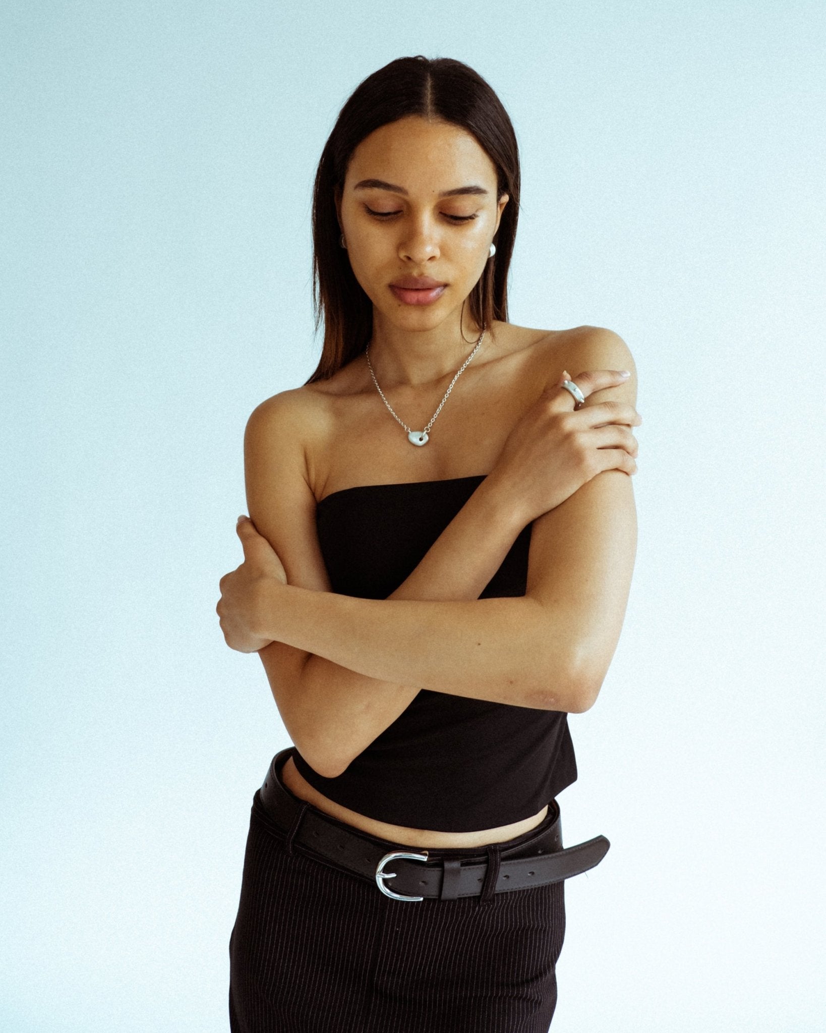 Modern silver jewelry featuring organic sculptural form