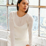 Minimalist silver necklace inspired by natural seed shapes