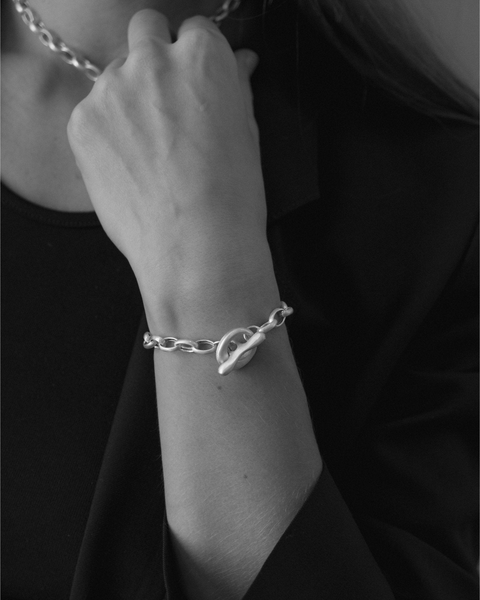 CKD Handcrafted silver bracelet photographed on wrist - Cklasic Designs