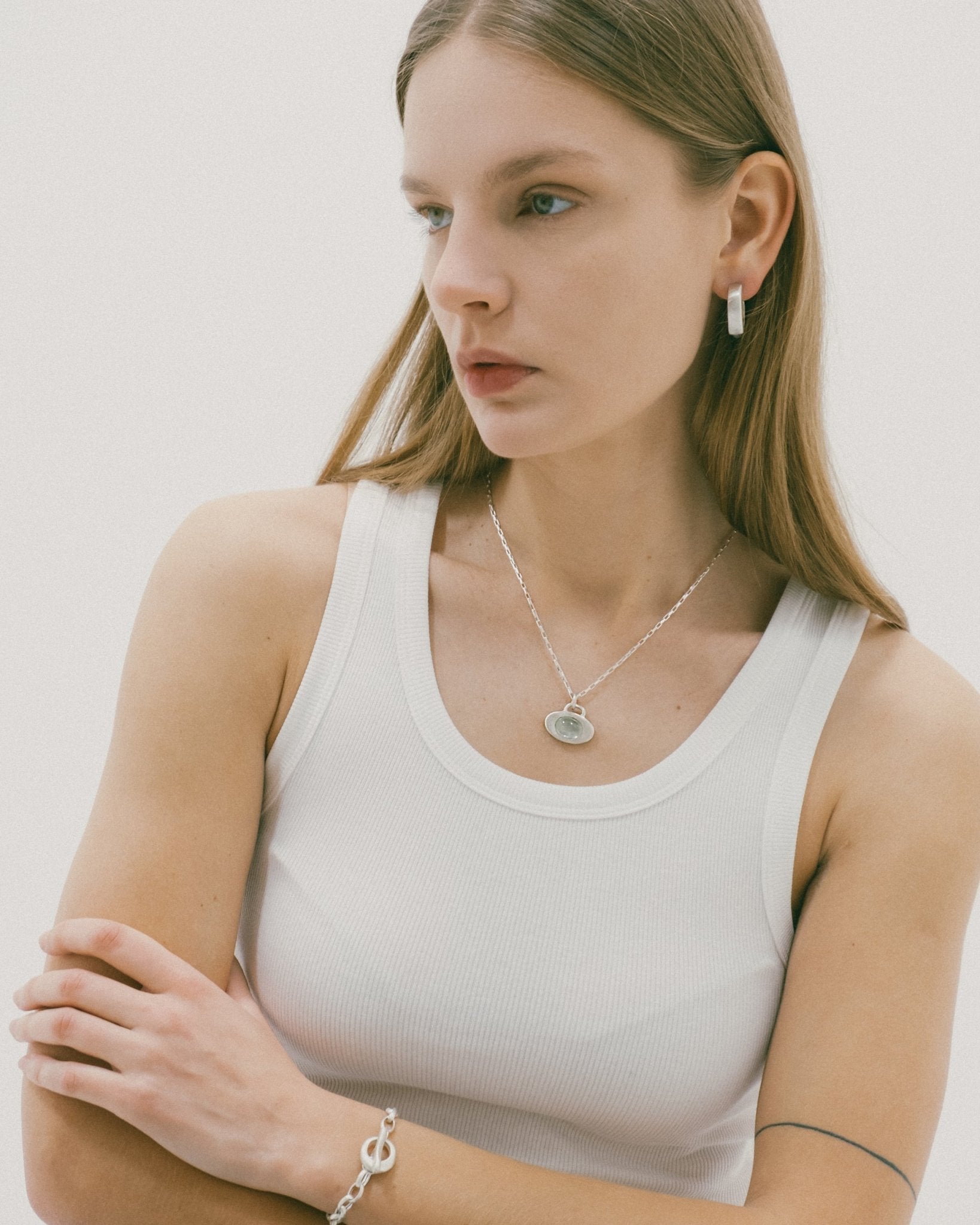 Handcrafted silver necklace photographed on model