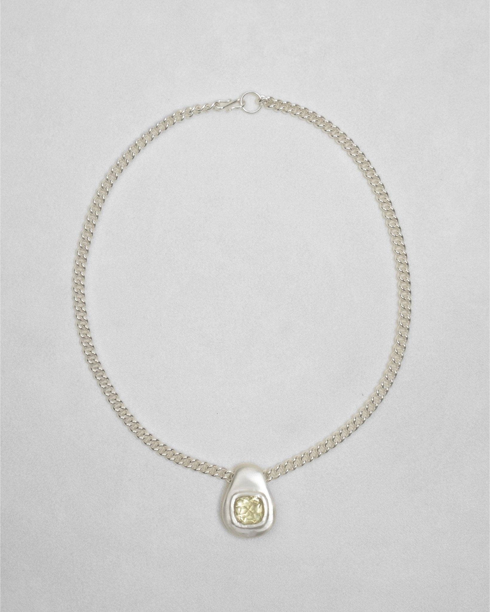 Handcrafted sterling silver pendant with modern form
