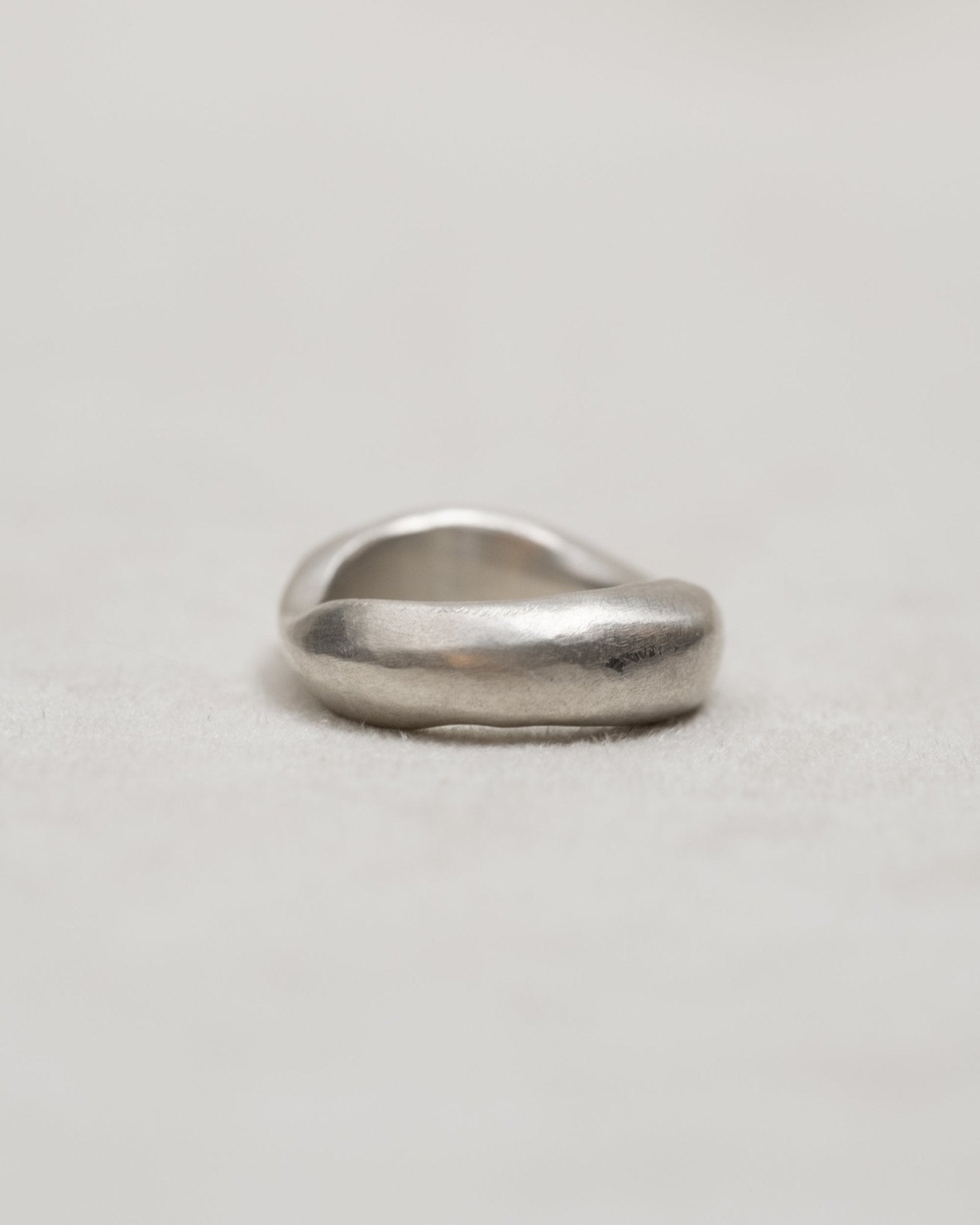 Bold sculptural silver ring with distinctive curves