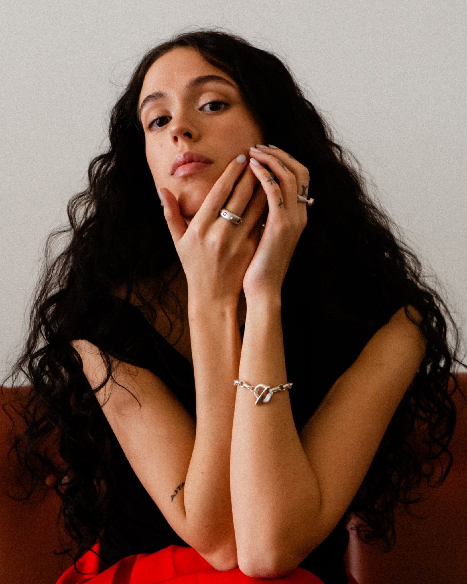 Sterling silver ring set with blue sapphires spaced by silver dots