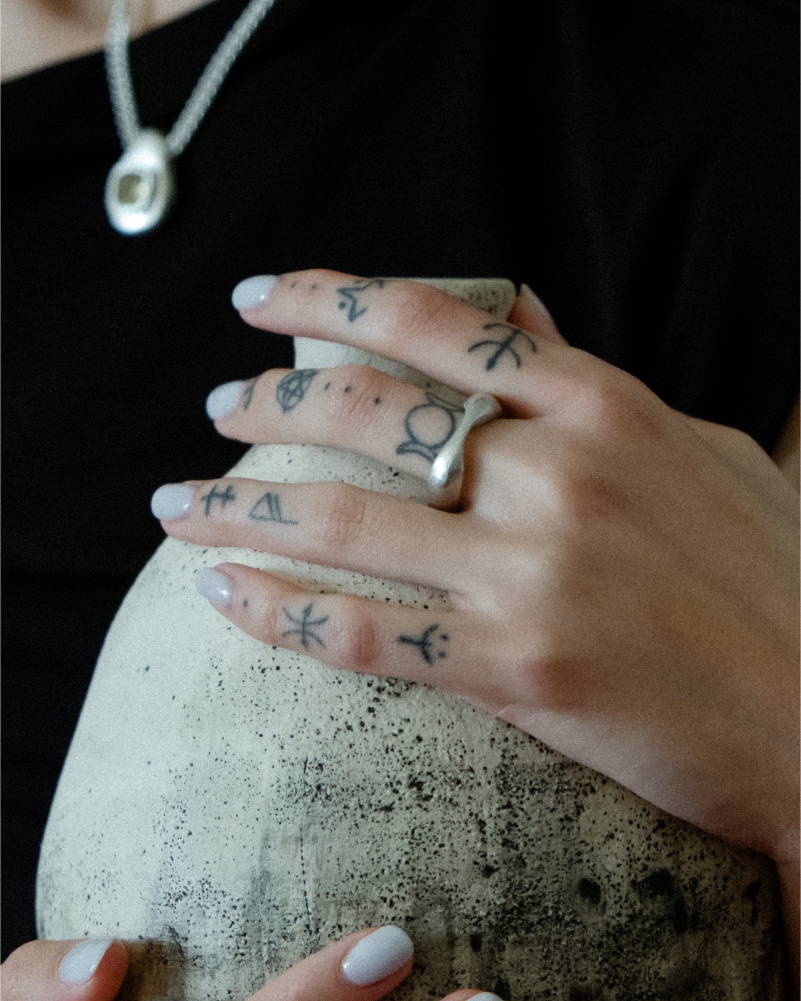 Organic, fluid silver ring with smooth flowing lines