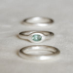 Minimalist silver gemstone ring with rounded band