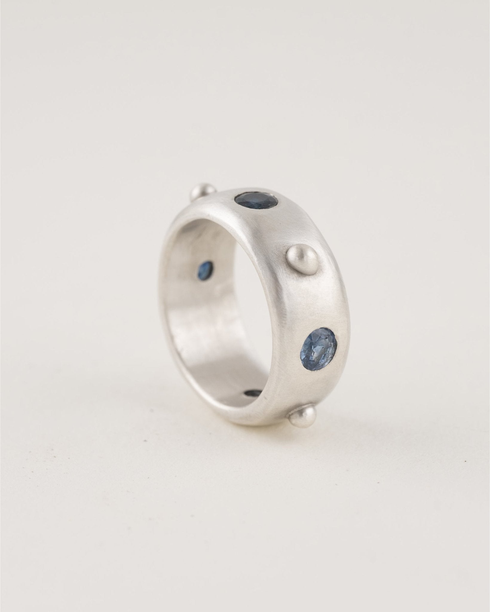 Fiora Ring wide sterling silver band with four 4mm gemstones