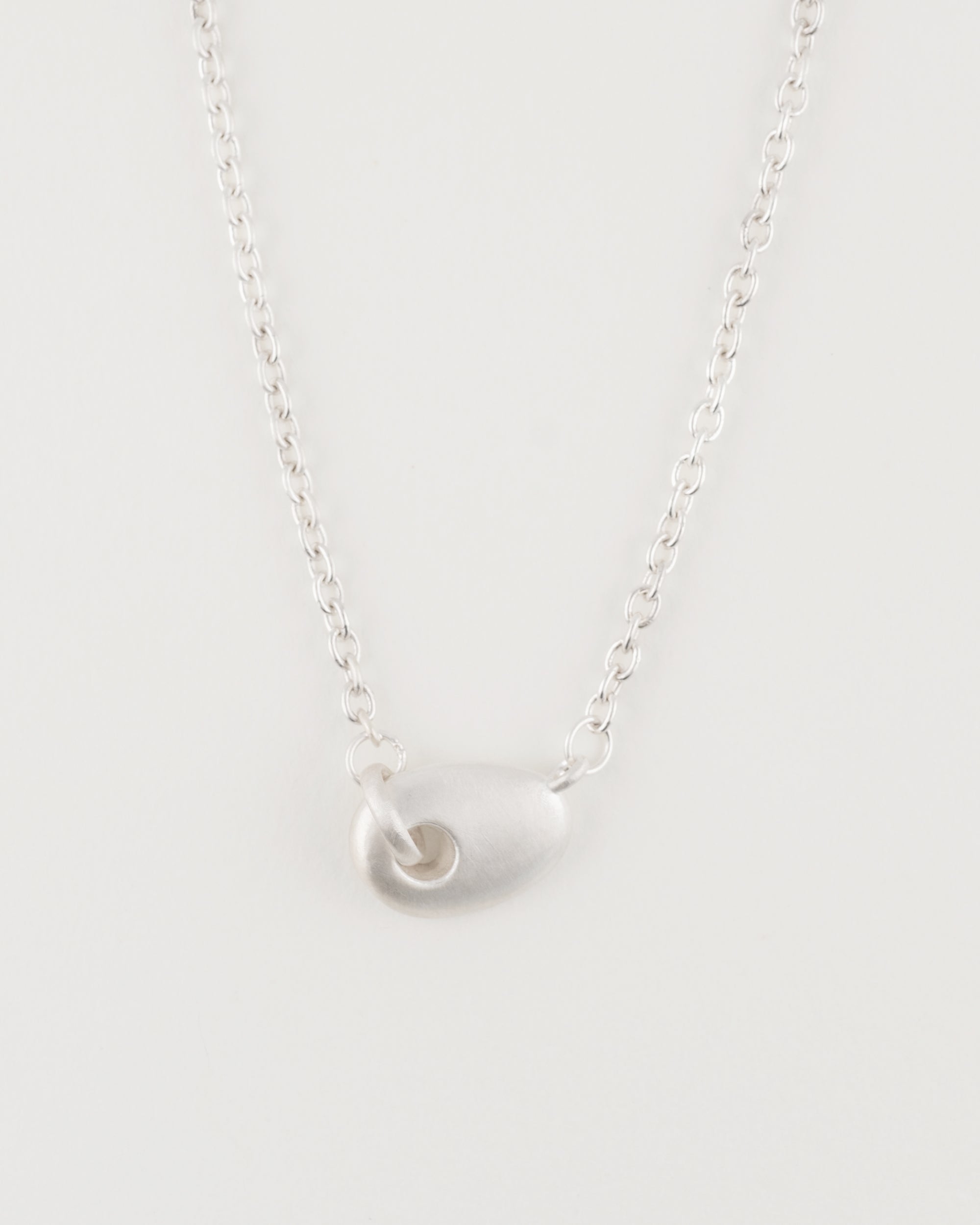 Auri Necklace sterling silver sculptural pendant on cable chain