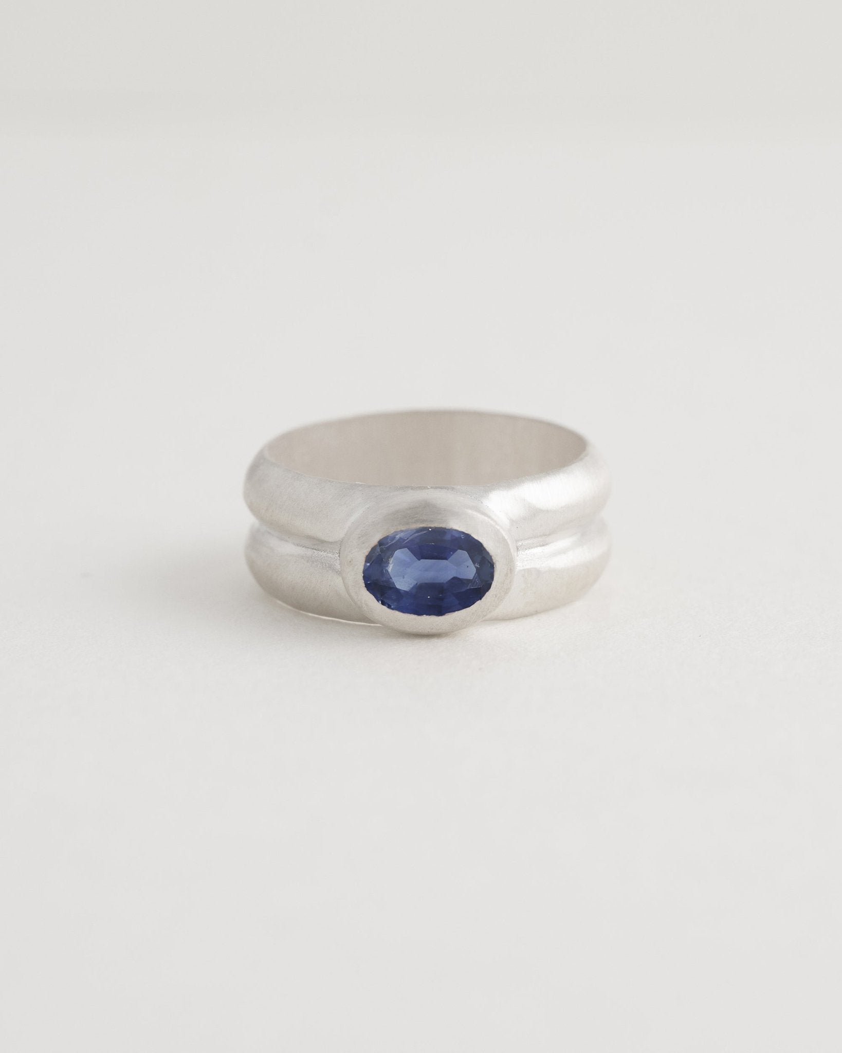 Sculptural Kuva ring photographed against neutral background