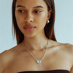 Sculptural silver half hoop earrings designed for daily wear