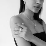 CKLASIC Pebble Necklace with purse-inspired sculptural design