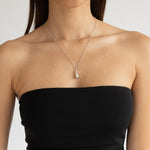 Understated sterling silver Seed Necklace styled for everyday wear